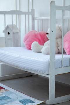 Наматрасник непромокаемый в детскую кроватку